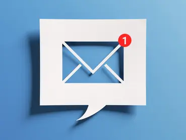 A white chat bubble with an envelope icon inside is depicted against a blue background. A red notification circle with the number "1" is positioned in the upper right corner of the envelope, indicating one new message.